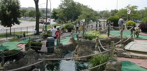 Image showing several golfers have fun playing miniature golf in Royal Oak.