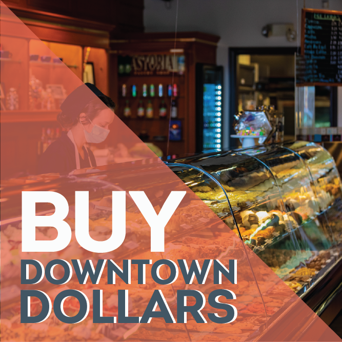 Buy Downtown Dollars text featured over a bakery display case with pastries