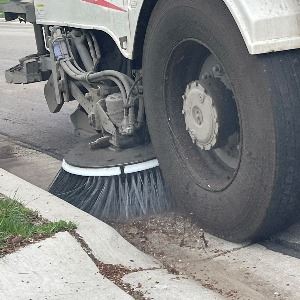 Royal Oak street sweeper cleans the road.