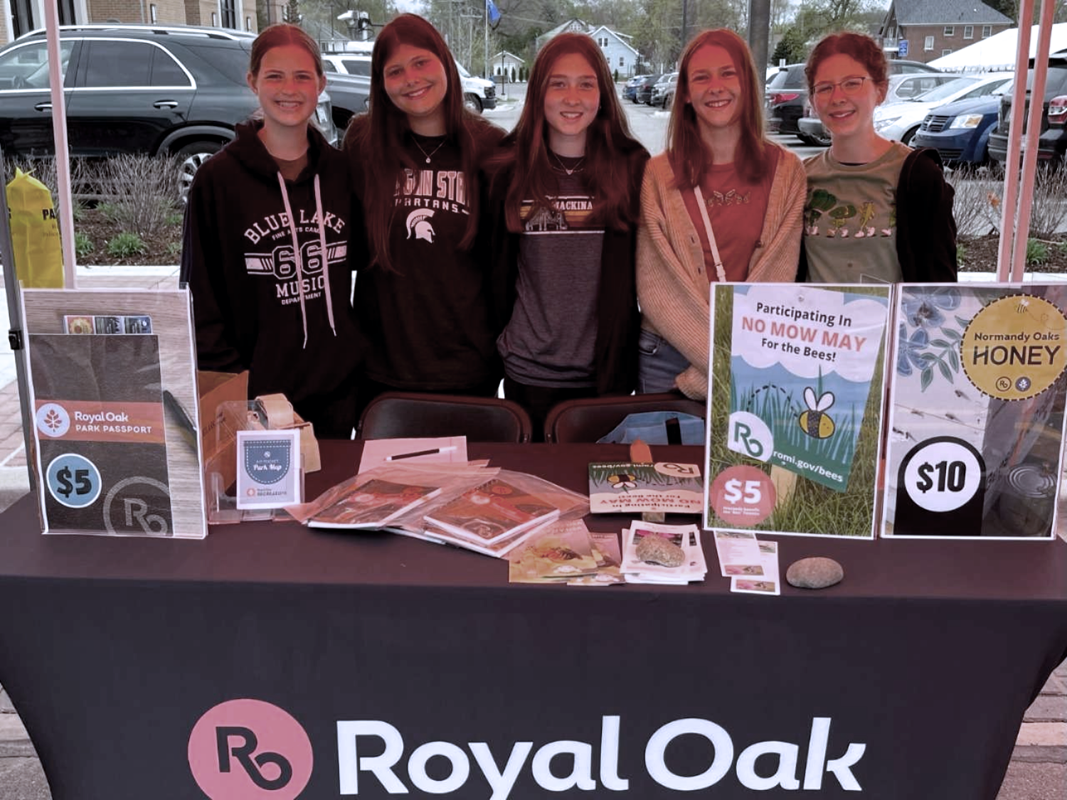 The BeeTweens promote No Mow May at Earth Day event